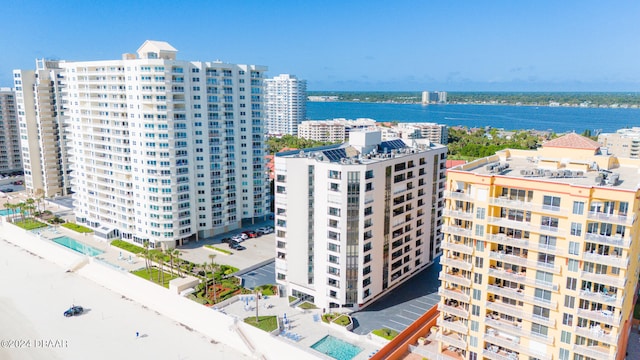 birds eye view of property featuring a water view