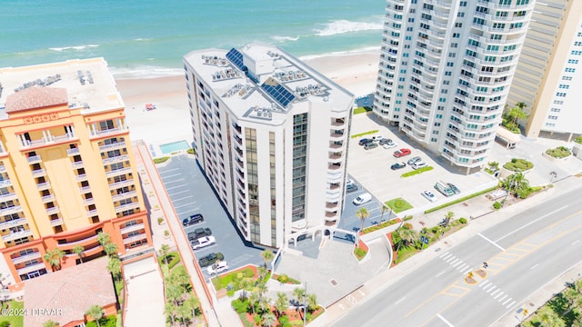 bird's eye view with a beach view and a water view