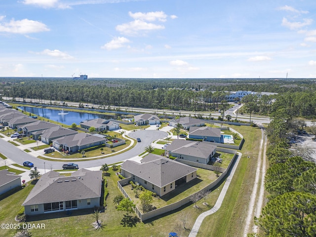 aerial view featuring a residential view and a water view