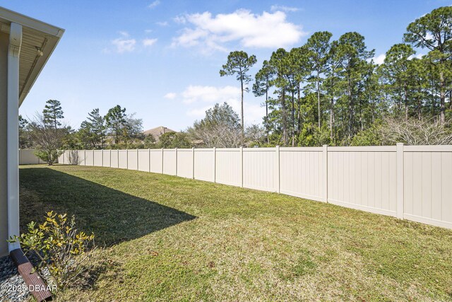 view of yard featuring a fenced backyard