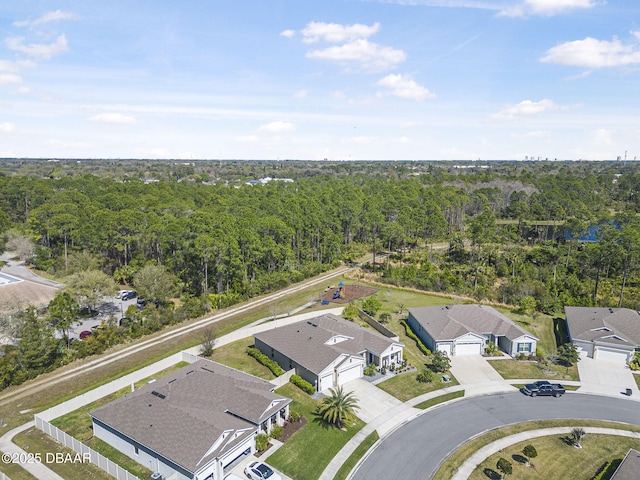 bird's eye view featuring a residential view and a view of trees