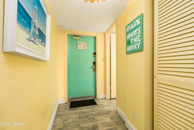 2301 S Atlantic Ave Unit 111, Daytona Beach, FL 32118 - doorway featuring wood finished floors and baseboards