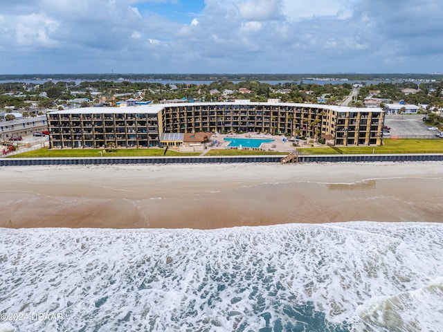 drone / aerial view with a view of the beach and a water view