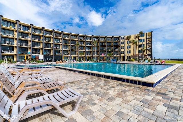 view of pool featuring a patio area