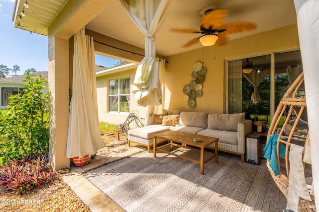 view of patio / terrace featuring ceiling fan