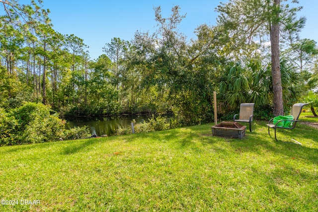 view of yard with a water view