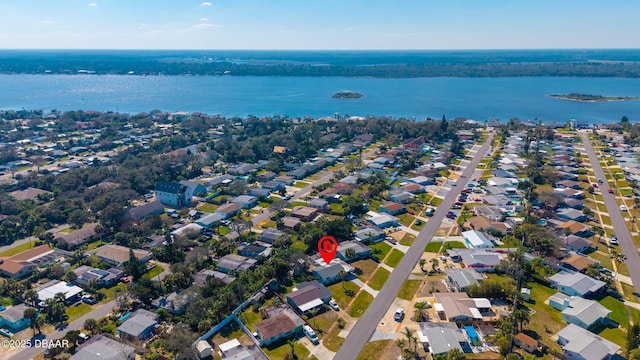 aerial view featuring a water view and a residential view