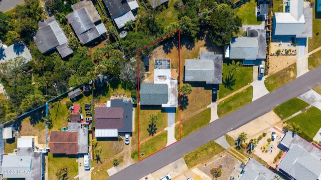 birds eye view of property with a residential view