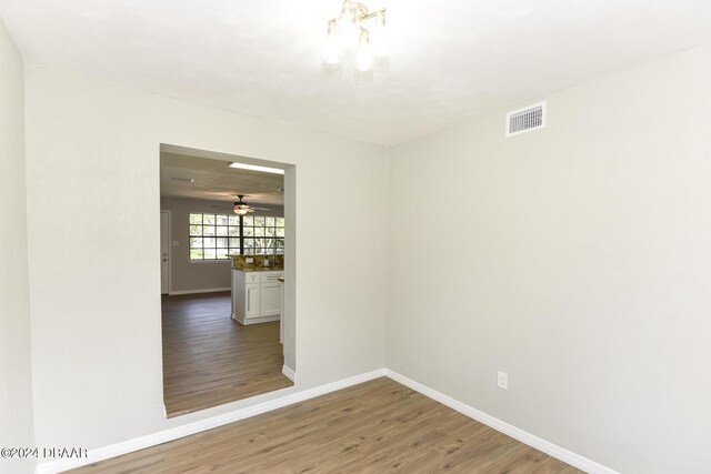 732 Orchard Ave, Ormond Beach, FL 32174 - empty room featuring wood finished floors, baseboards, and ceiling fan
