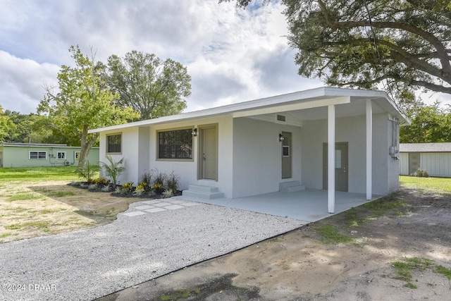 732 Orchard Ave, Ormond Beach, FL 32174 - view of front of house featuring entry steps and stucco siding