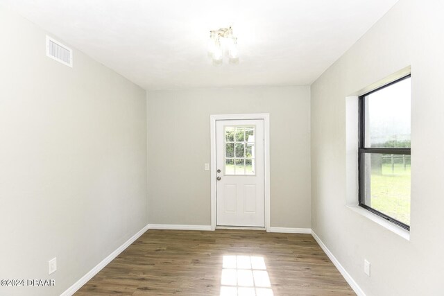 732 Orchard Ave, Ormond Beach, FL 32174 - spare room featuring wood finished floors and baseboards