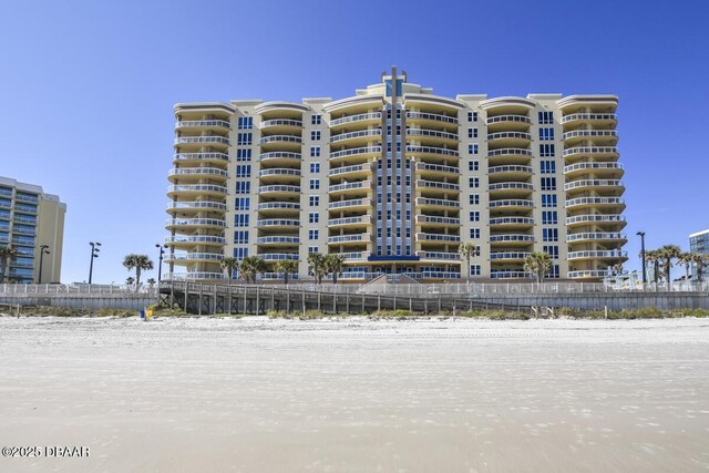 view of building exterior featuring a water view