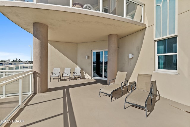 view of patio / terrace with a balcony