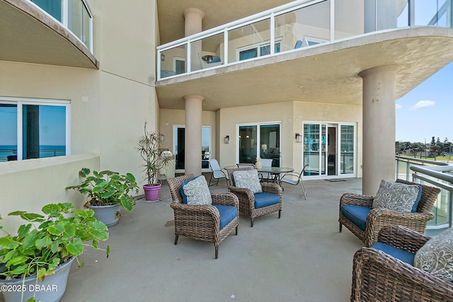 view of patio / terrace with a balcony