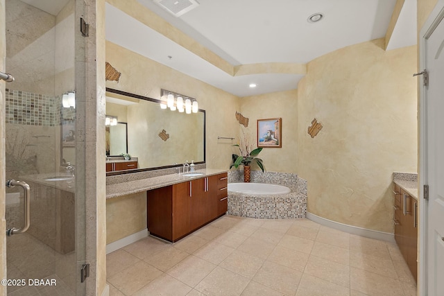 bathroom with visible vents, tile patterned floors, a garden tub, vanity, and a shower stall