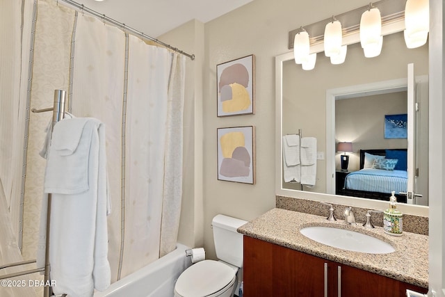 ensuite bathroom featuring toilet, shower / bath combination with curtain, ensuite bath, and vanity