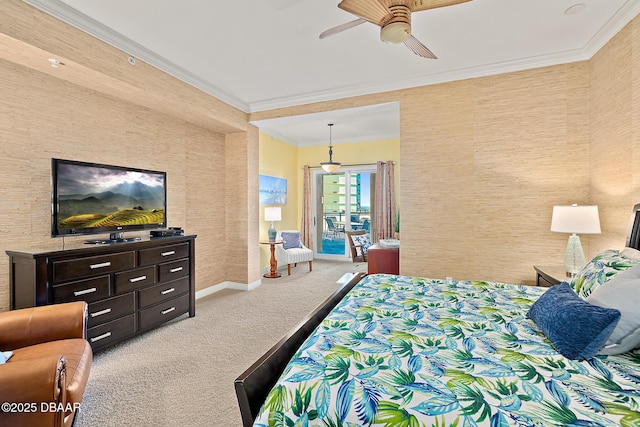 carpeted bedroom featuring ornamental molding, a ceiling fan, and baseboards