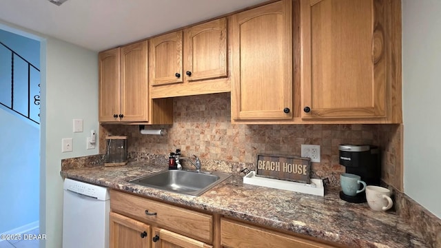 2820 Ocean Shore Blvd Unit 28, Ormond Beach, FL 32176 - kitchen with white dishwasher and tasteful backsplash
