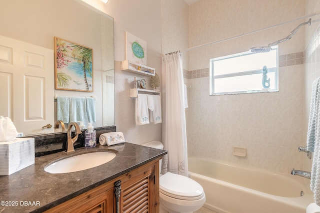 full bathroom featuring vanity, shower / tub combo with curtain, and toilet