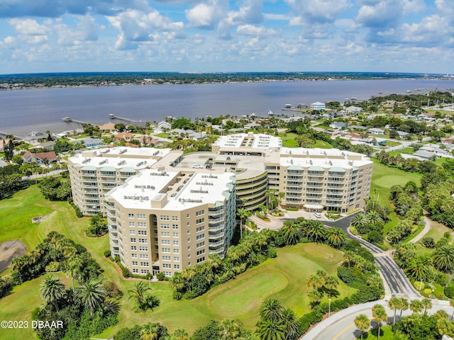 4 Oceans W Blvd Unit 307D, Daytona Beach Shores, FL 32118 - drone / aerial view of apartment complex / building, a local golf course, and a nearby body of water