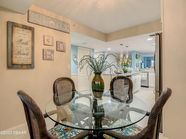 4 Oceans W Blvd Unit 307D, Daytona Beach Shores, FL 32118 - dining room with baseboards and recessed lighting