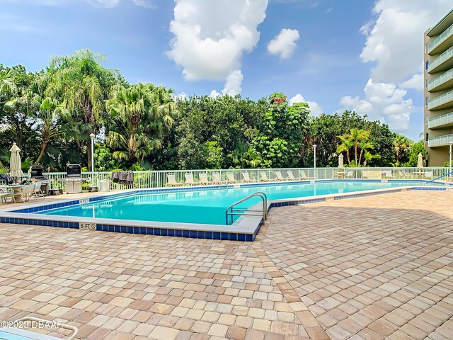 view of pool with a patio area