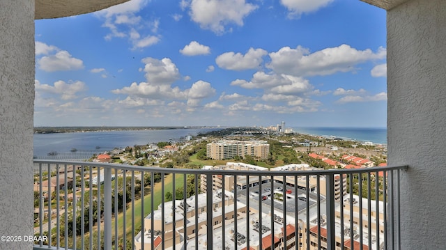 balcony featuring a water view