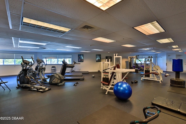 workout area featuring a drop ceiling