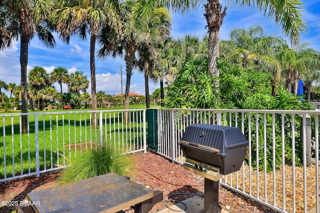 view of patio featuring a grill