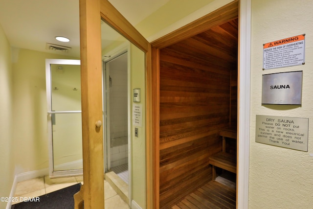 view of sauna with tile patterned flooring