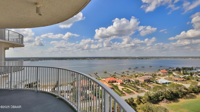 balcony featuring a water view