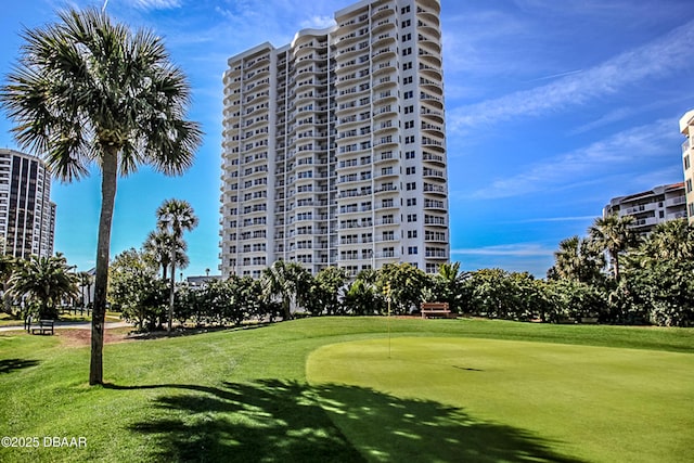 surrounding community featuring a lawn