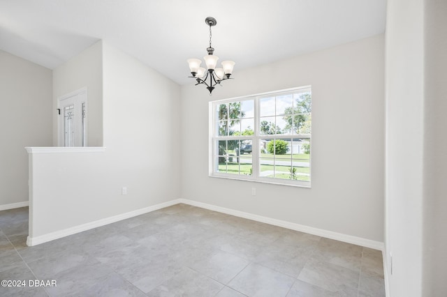 30 Peppercorn Ln, Palm Coast, FL 32164 - spare room with a chandelier, baseboards, and light tile patterned floors