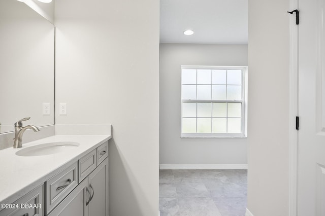 30 Peppercorn Ln, Palm Coast, FL 32164 - bathroom with vanity and baseboards