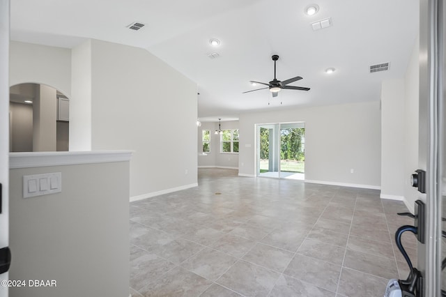 30 Peppercorn Ln, Palm Coast, FL 32164 - unfurnished living room with ceiling fan, vaulted ceiling, baseboards, light tile patterned floors, and recessed lighting