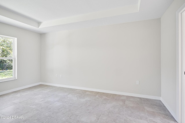 30 Peppercorn Ln, Palm Coast, FL 32164 - unfurnished room featuring a raised ceiling and baseboards