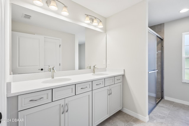 30 Peppercorn Ln, Palm Coast, FL 32164 - full bath with double vanity, a shower stall, baseboards, and tile patterned flooring