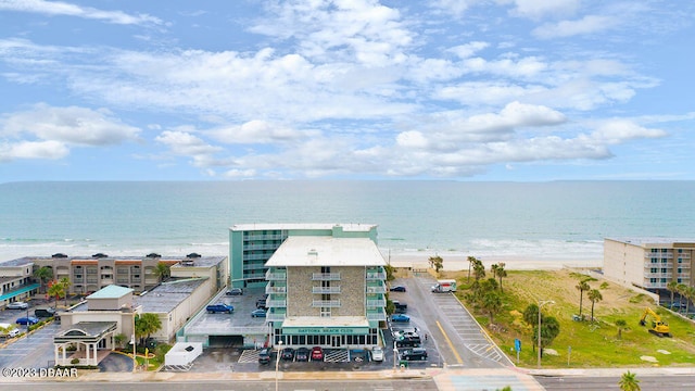 view of water feature with a beach view