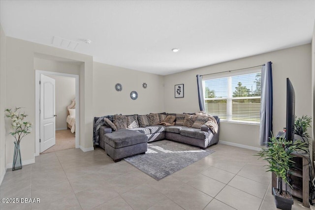 living room featuring light tile patterned floors