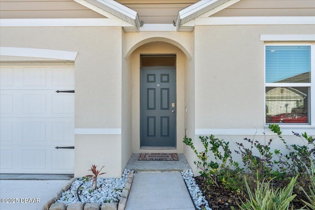 entrance to property with a garage