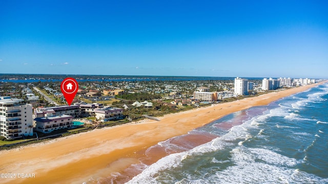 aerial view with a view of the beach and a water view