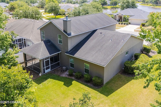 drone / aerial view with a residential view