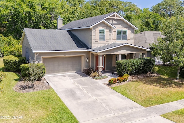 craftsman-style house with a front lawn, a chimney, an attached garage, driveway, and a porch