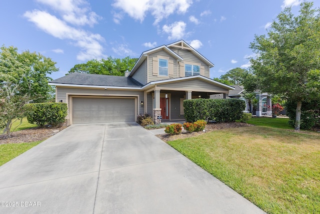 craftsman inspired home featuring covered porch, driveway, a front yard, and a garage