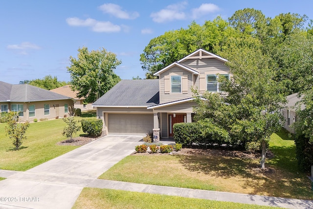craftsman house featuring an attached garage, driveway, and a front lawn