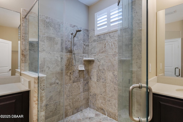 full bath featuring a shower stall and vanity
