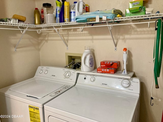 laundry area with separate washer and dryer