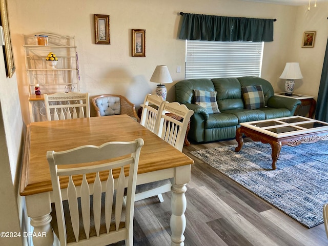 dining space featuring hardwood / wood-style flooring