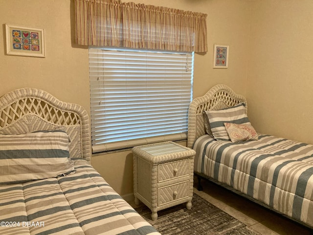 bedroom with tile patterned flooring