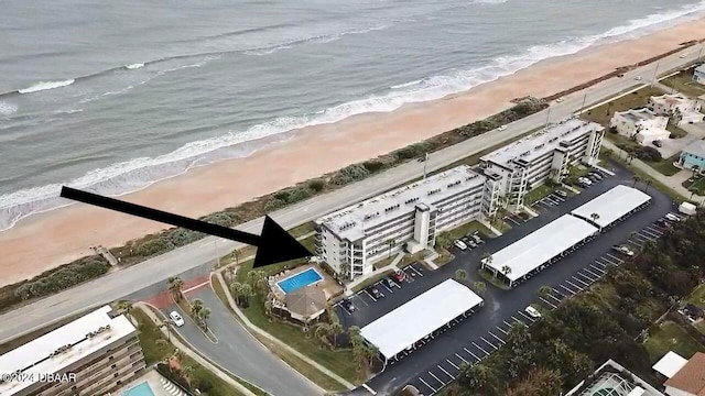 bird's eye view with a view of the beach and a water view